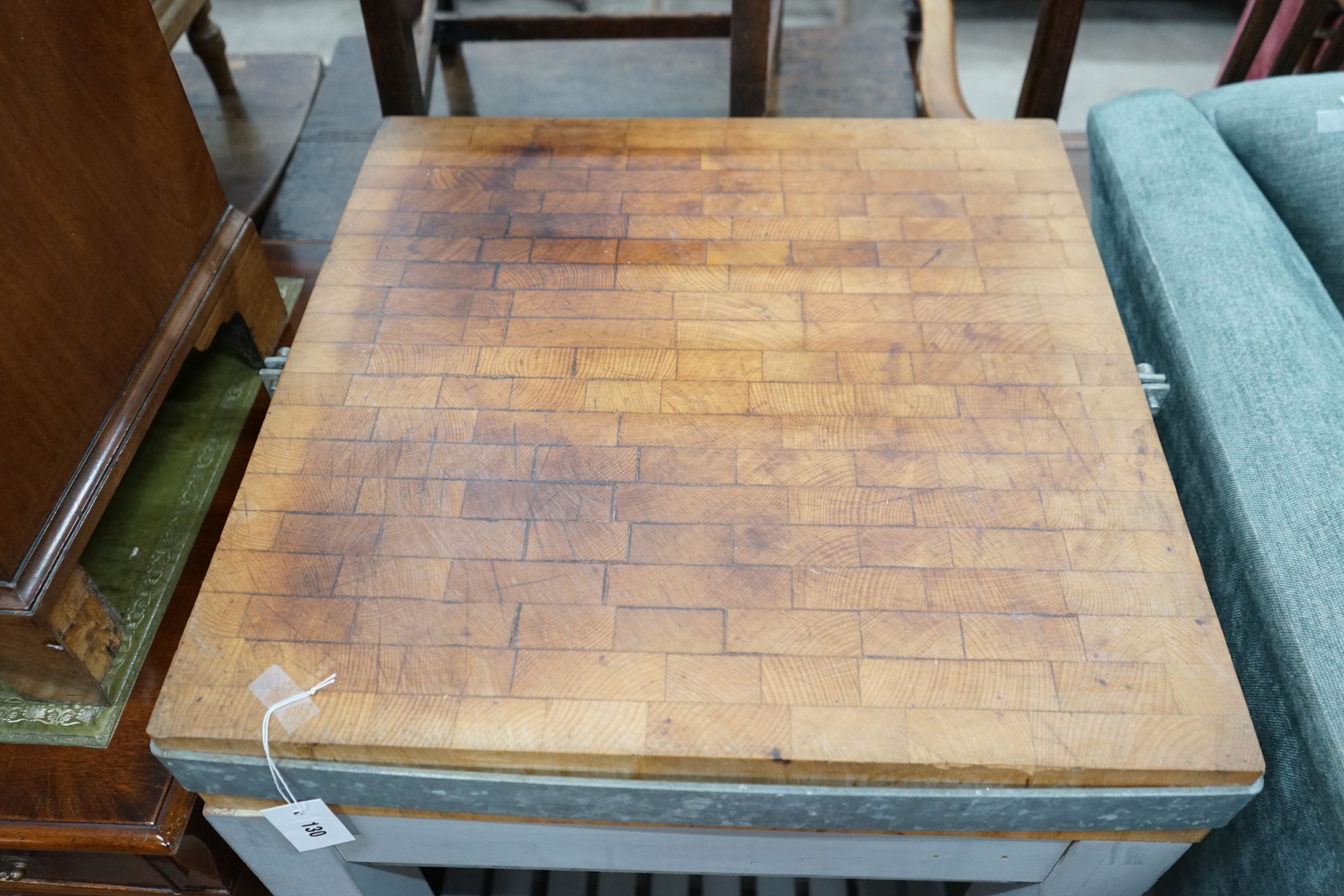 A square butcher's block on painted stand, width 60cm, height 90cm